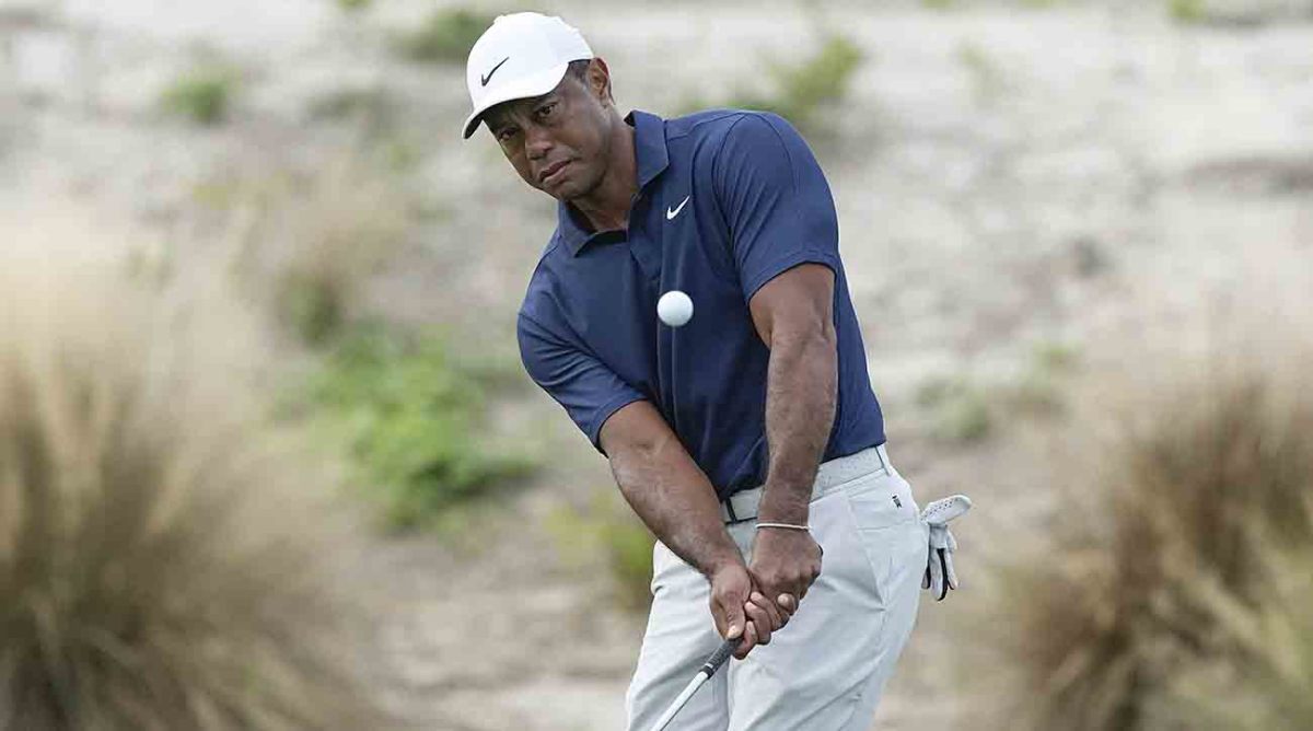 Tiger Woods watches his shot during a practice round for the Hero World Challenge at the Albany Golf Club, in New Providence, Bahamas, Wednesday, Nov. 29, 2023.